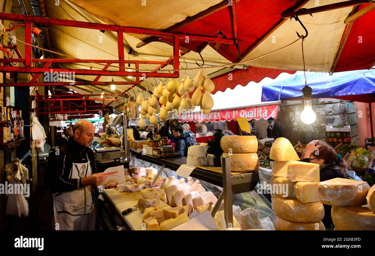 An Italian cheese shop at the vibrant market in Catania, Italy. Stock Photo