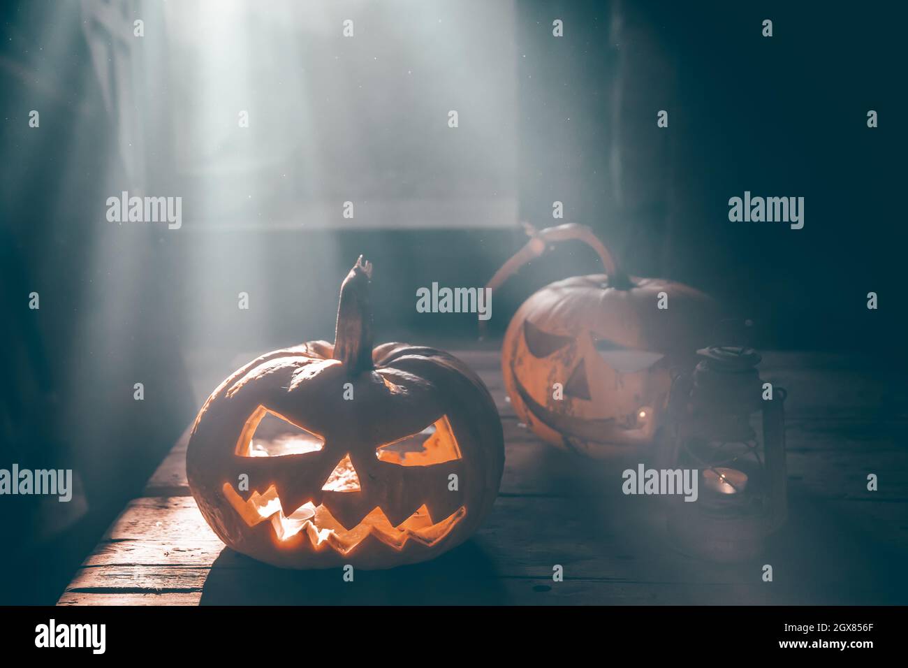 Jack O' Lanterns glowing in smoky fantasy night. Halloween background ...
