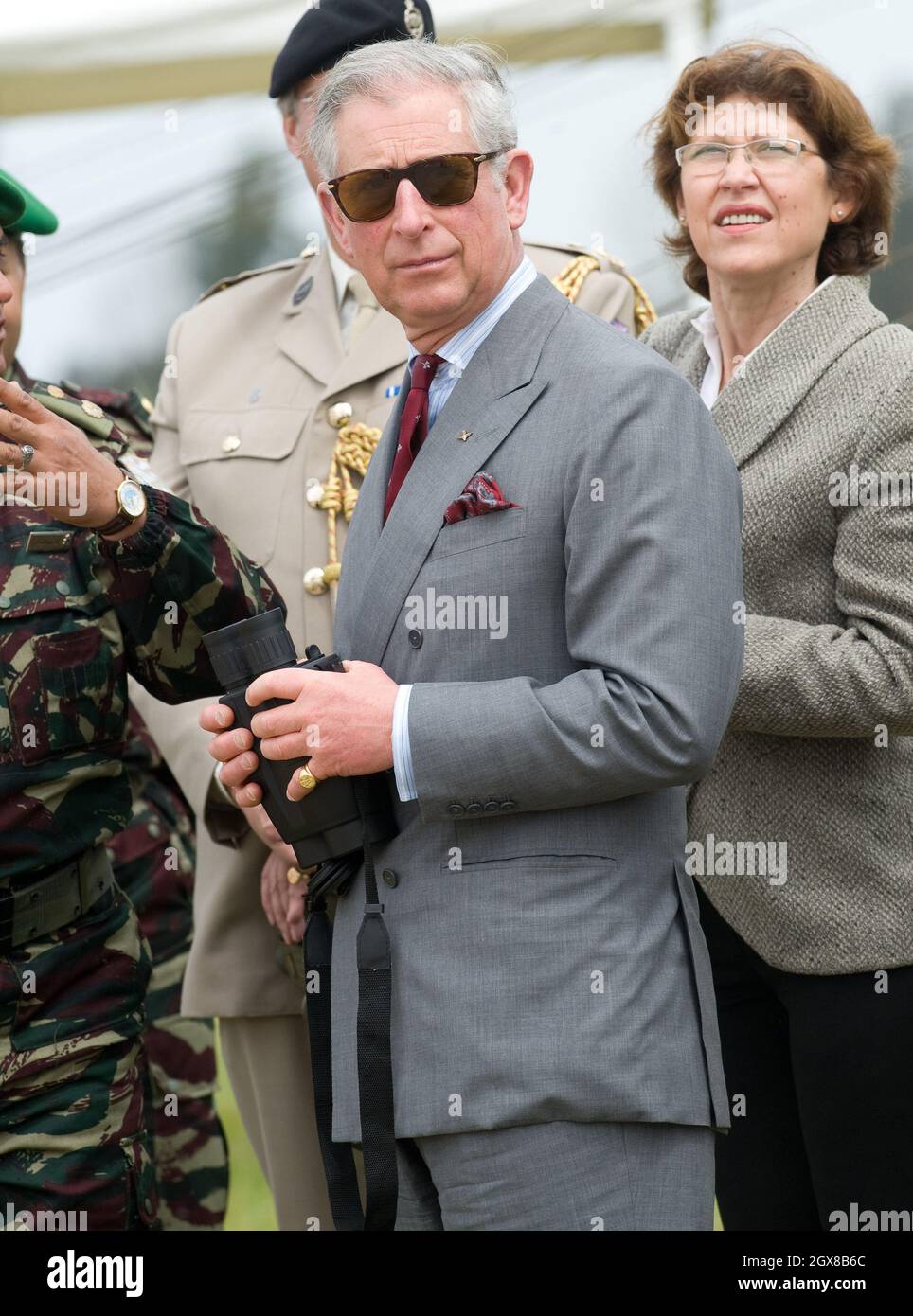 Prince Charles, Prince of Wales watches a display when he visits the 1st Brigade Infanterie Parachutiste in Rabat, Morocco on April 4, 2011. Stock Photo