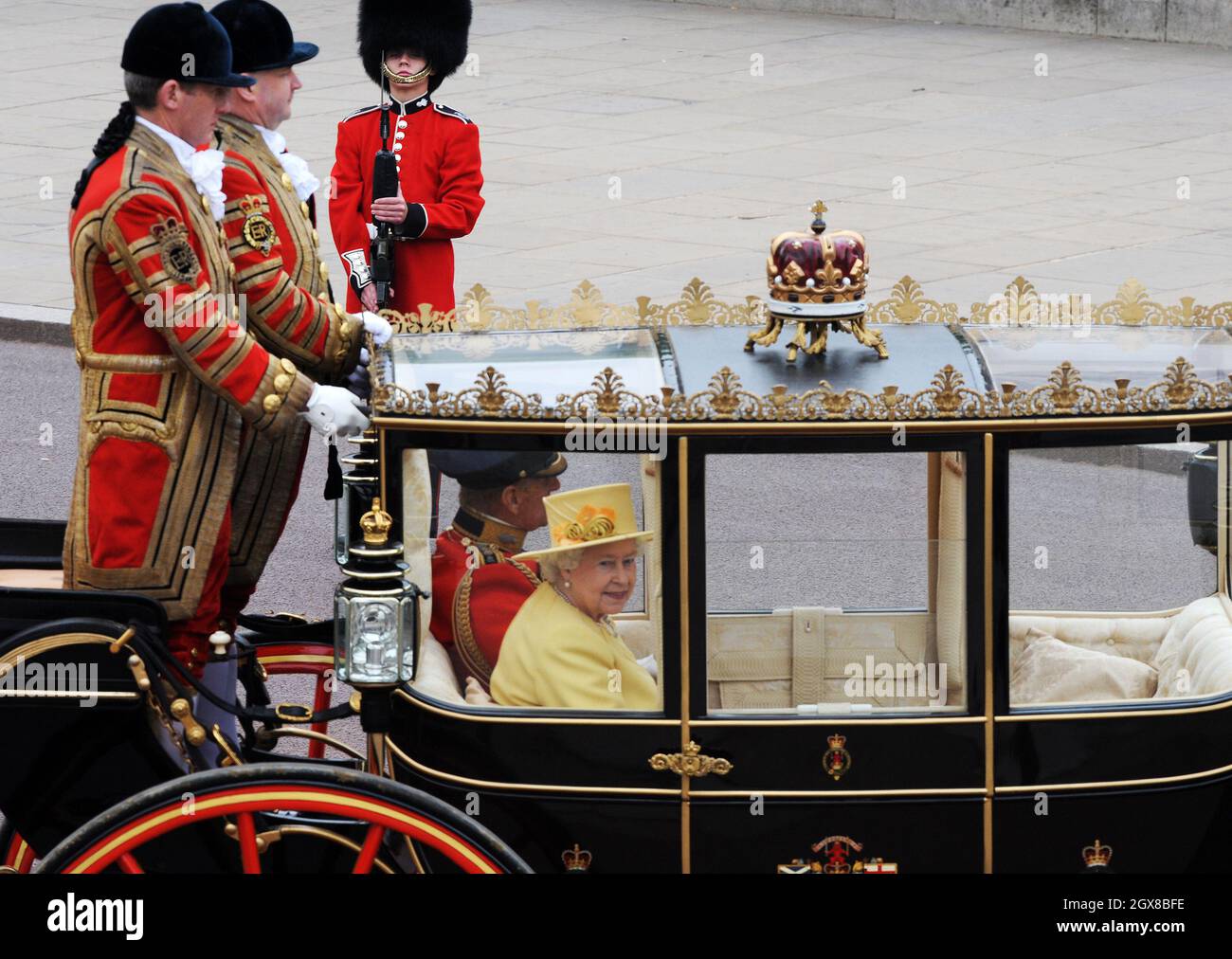 Queen Elizabeth ll and Prince Philip, Duke of Edinburgh arrive at Buckingham Palace in a coach following the wedding of Prince William and Catherine Middleton on April 29, 2011. Stock Photo