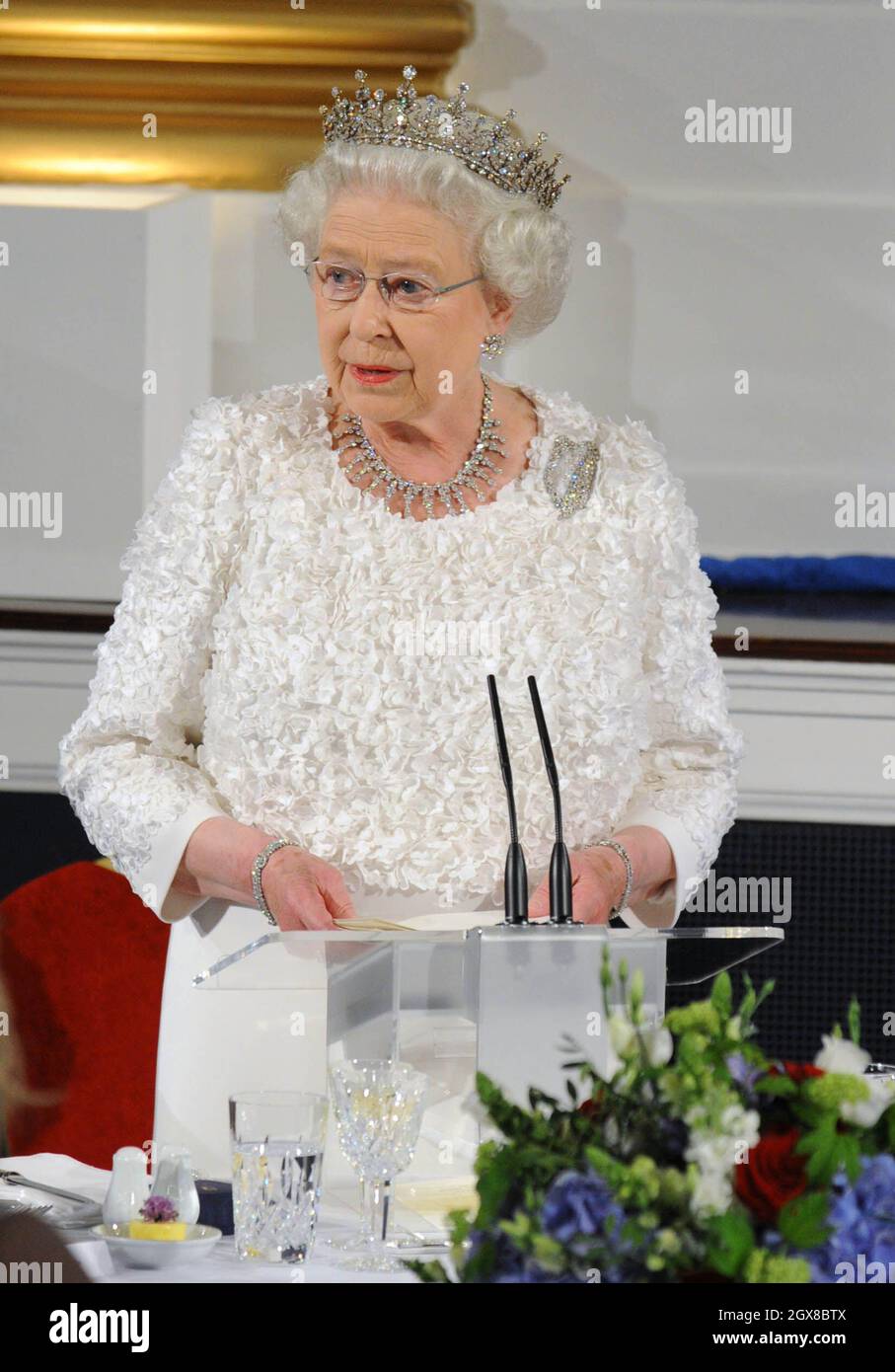 Queen Elizabeth II delivers a speech during a State Dinner at Dublin
