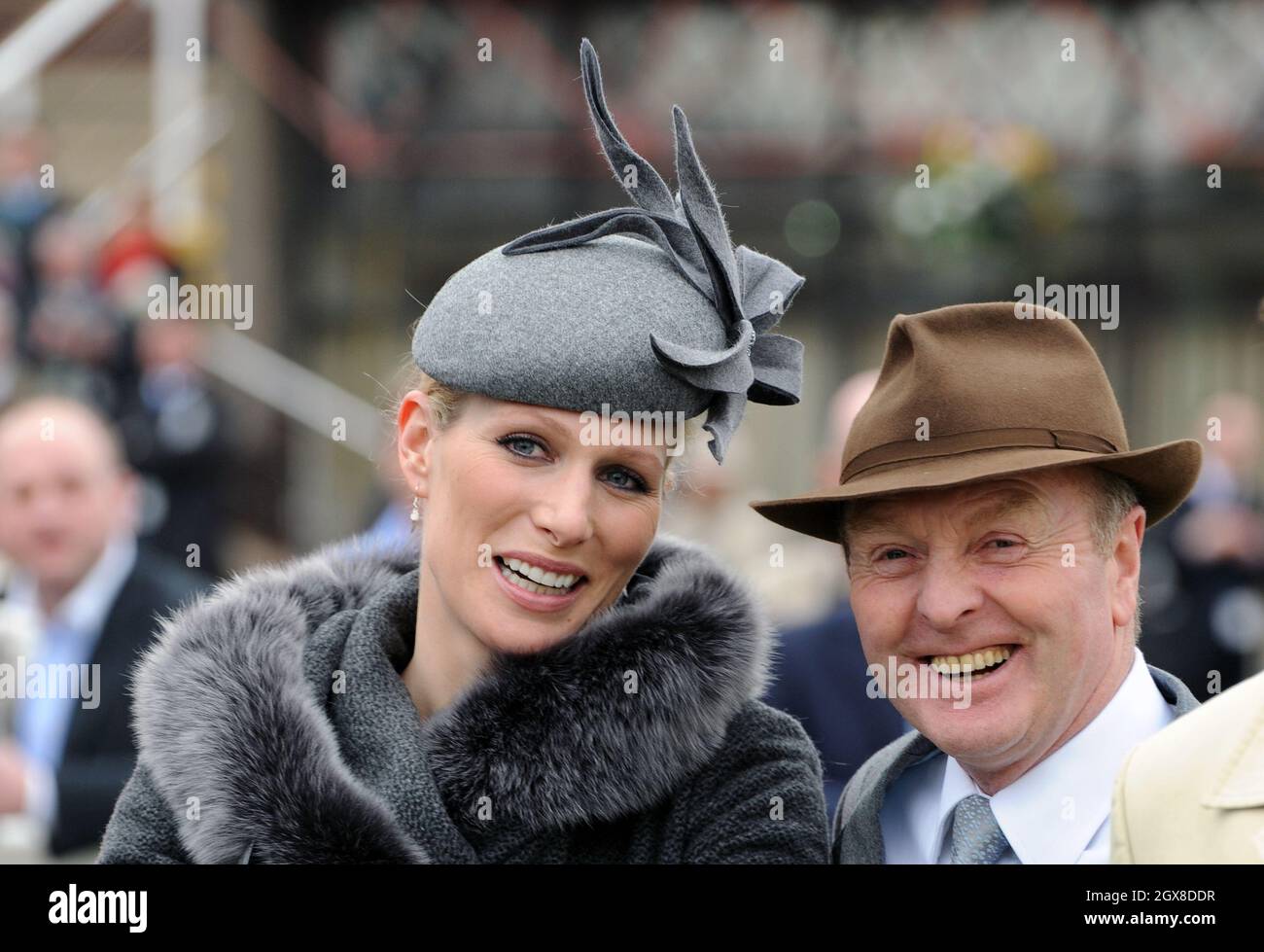 Zara Phillips and trainer Jonjo O'Neill attend the first day of of the Cheltenham Festival races Stock Photo