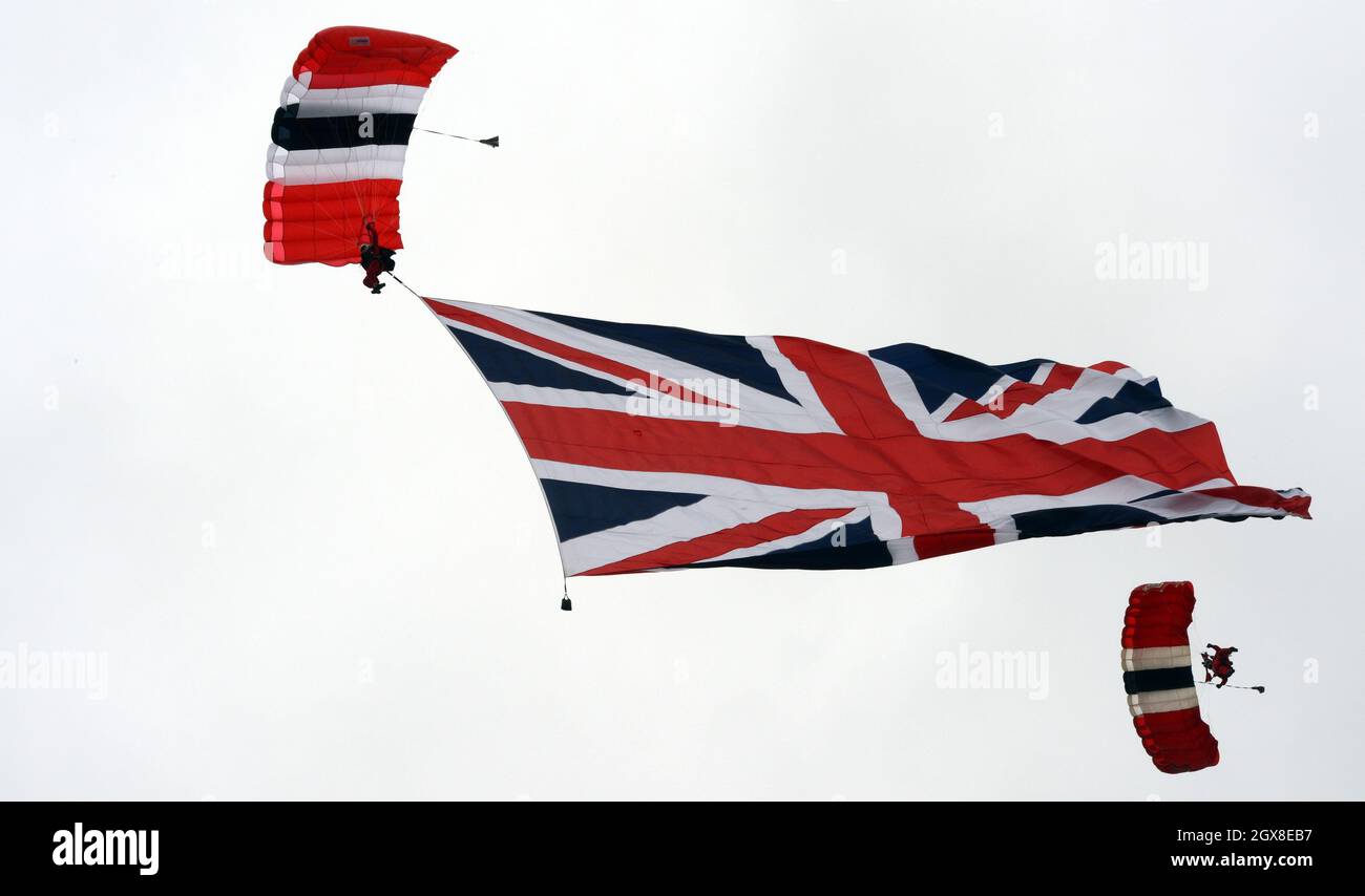 The Red Devils parachute display team drop in on the Investec Derby on June 2, 2012 at the start of Queen's Diamond Jubilee celebrations this weekend. Stock Photo