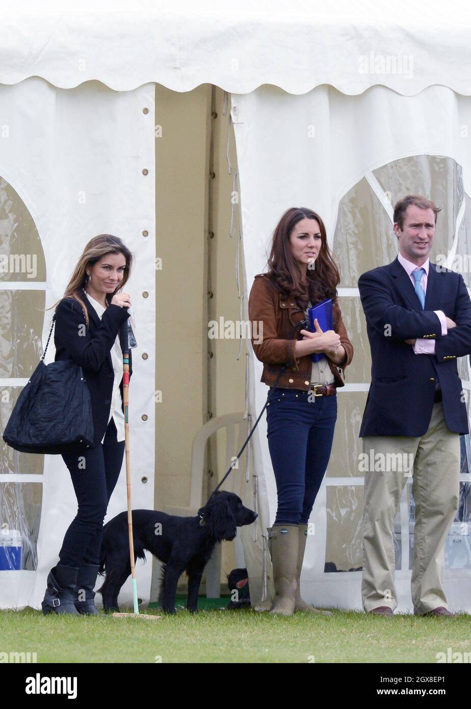 Catherine, Duchess of Cambridge relaxes with her dog Lupo at the