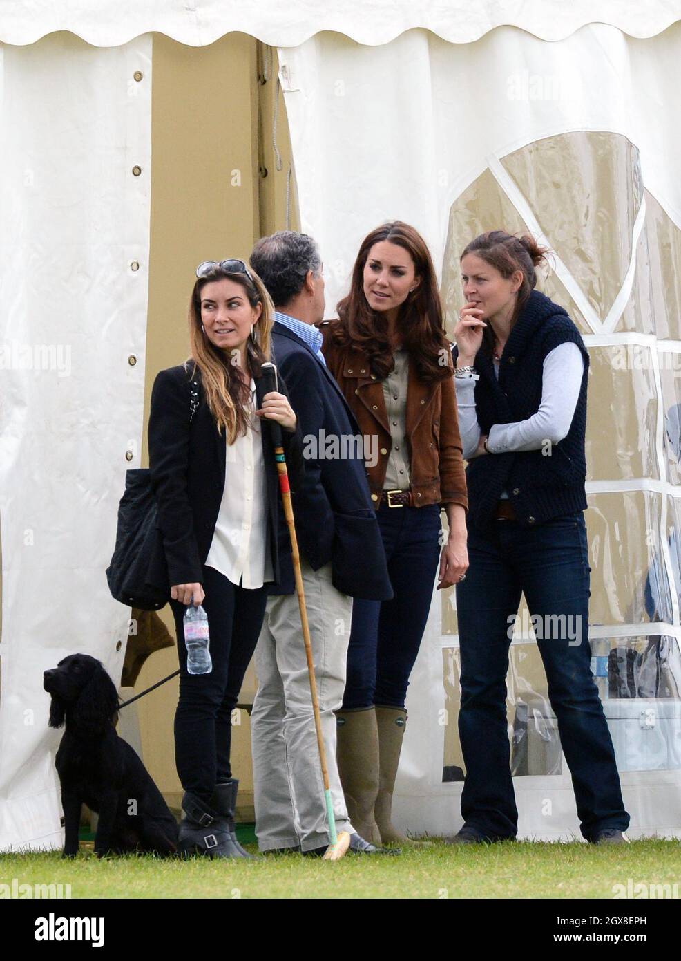 Catherine, Duchess of Cambridge relaxes with her dog Lupo at the