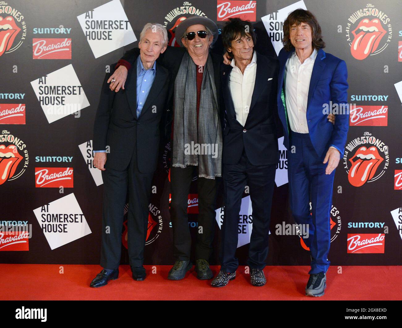 (L-R) Charlie Watts, Keith Richards, Ronnie Wood and Mick Jagger attend an exhibition to celebrate the 50th anniversary of The Rolling Stones at Somerset House on July 12, 2012. Stock Photo
