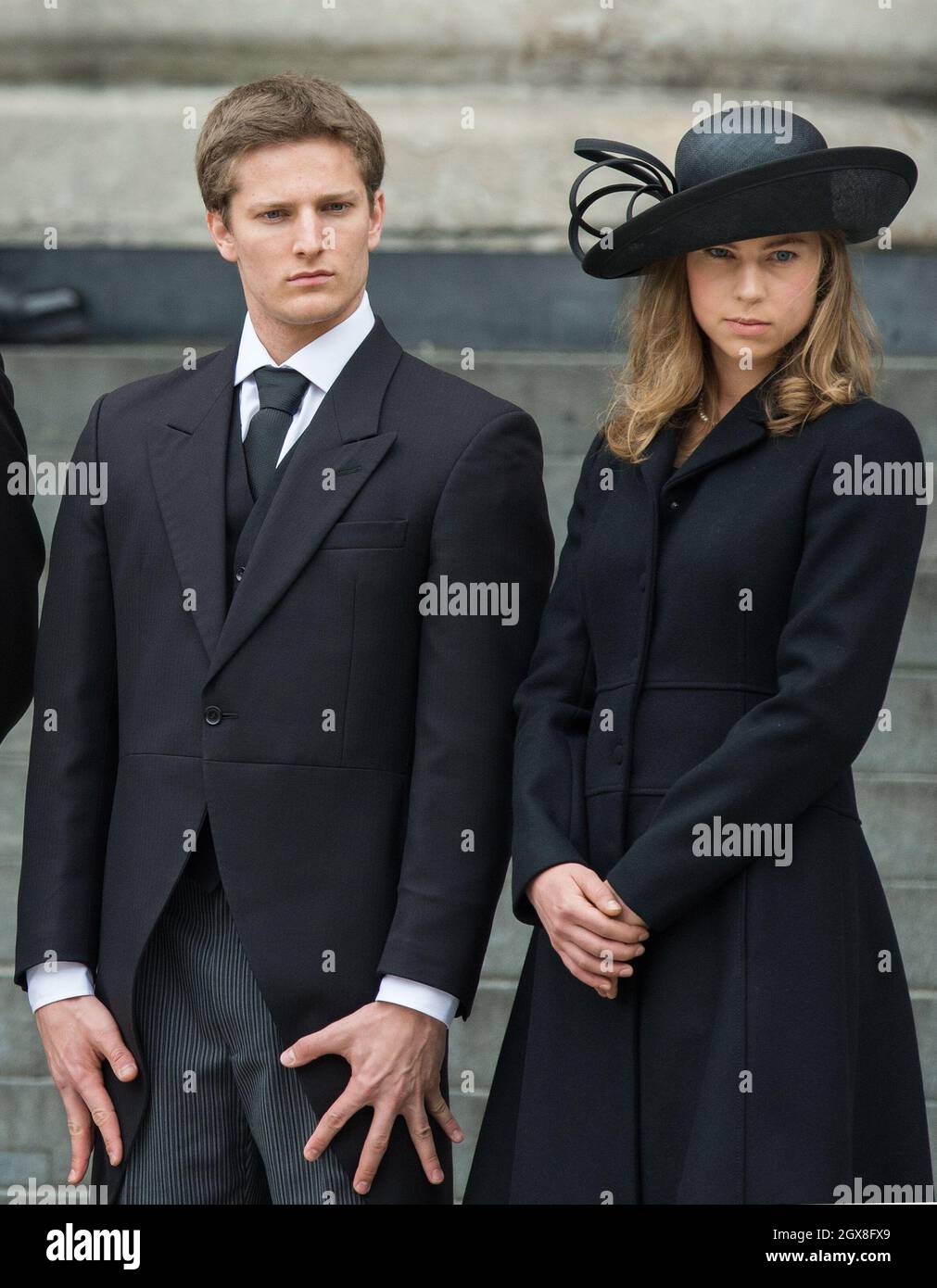 Michael Thatcher and Amanda Thatcher leave St. Paul's Cathedral following the funeral of their grandmother Margaret Thatcher on April 17, 2013. Stock Photo