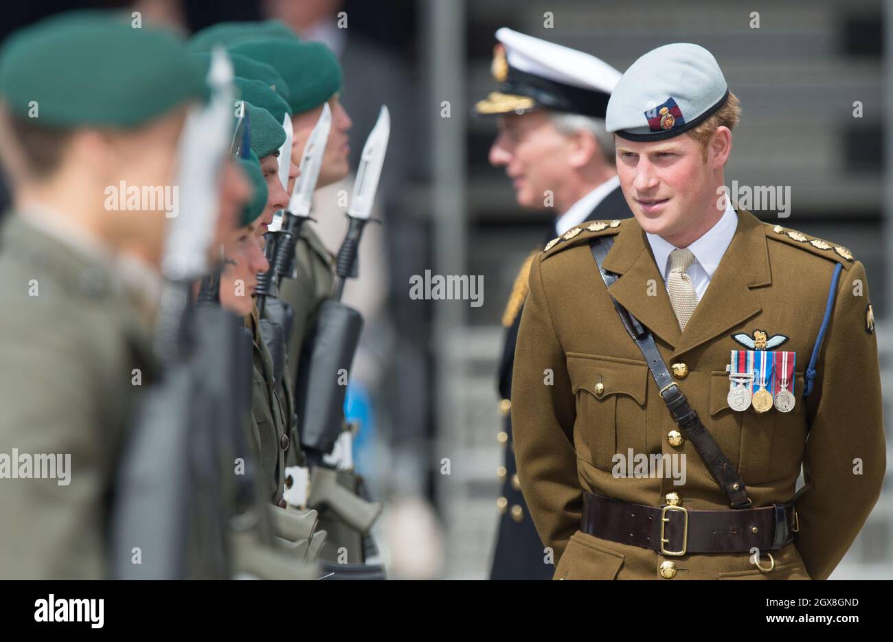Prince Harry visits Royal Marines Tamar at HM Naval Base Devonport to officially open the Royal Navy's newly build centre of amphibious excellence on August 2, 2013. Stock Photo