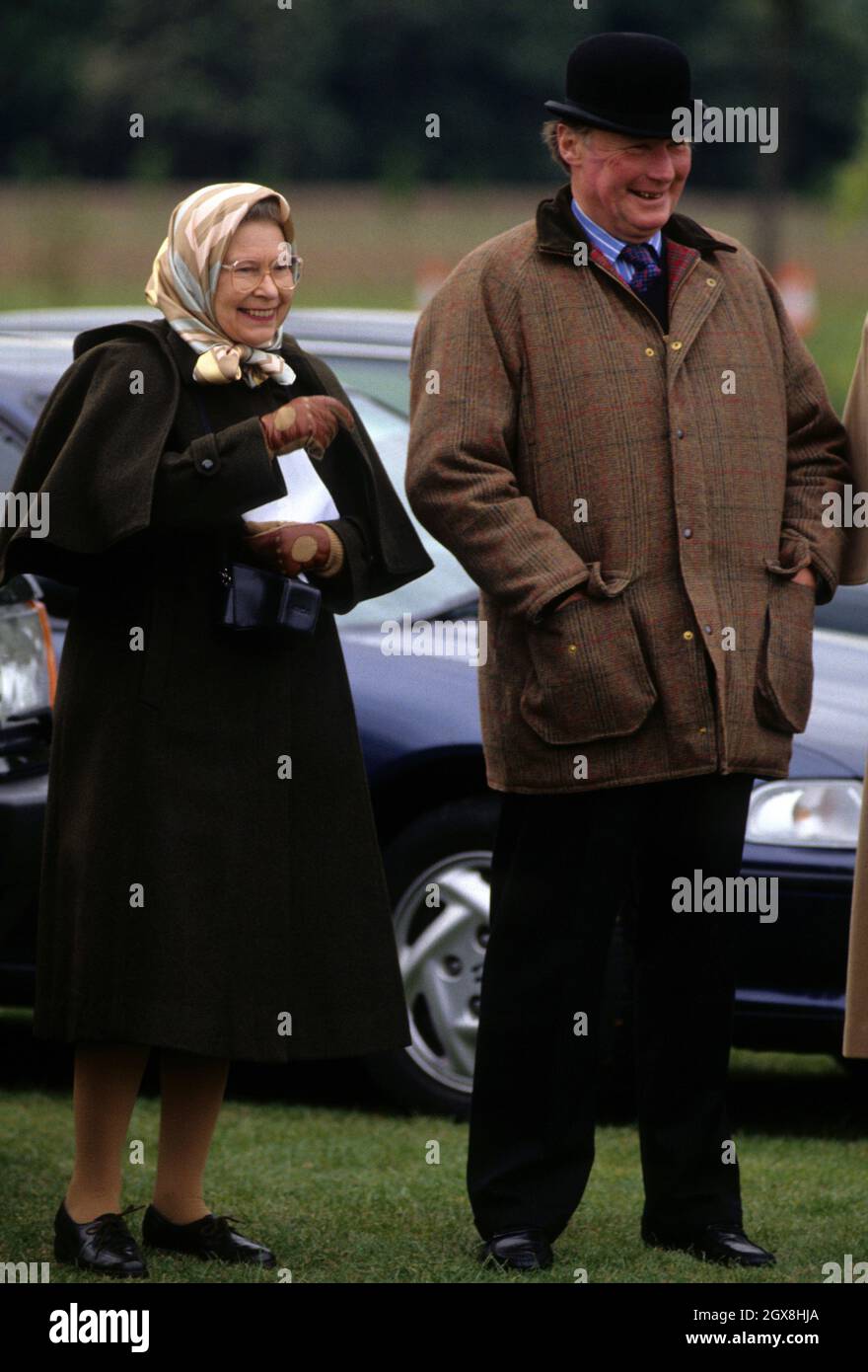 Queen Elizabeth II and Horse Trainer Howard Johnson attending the Windsor  Horse Show in Windsor Stock Photo - Alamy