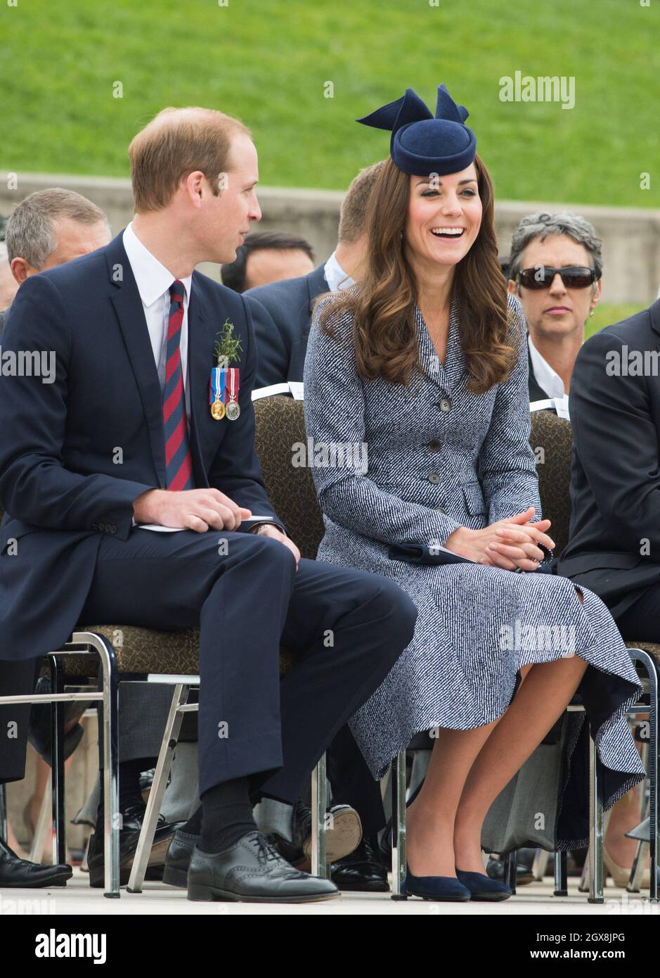 Catherine, Duchess of Cambridge and Prince William, Duke of Cambridge attend the ANZAK Day Service at the Australian War Memorial in Canberra, Australia on April 25, 2014. The Duchess is wearing a blue hat by Australian milliner Jonathan Howard Stock Photo