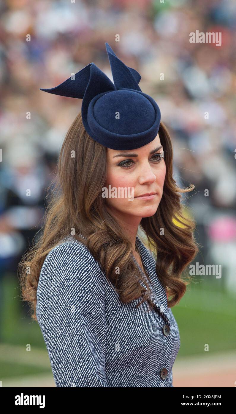 Catherine, Duchess of Cambridge attends the ANZAK Day Service at the Australian War Memorial in Canberra, Australia on April 25, 2014. The Duchess is wearing a blue hat by Australian milliner Jonathan Howard Stock Photo