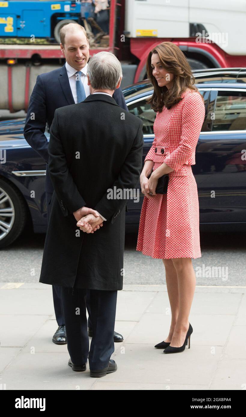 Prince William, Duke of Cambridge and Catherine, Duchess of Cambridge, wearing a red and white skirt and top by London based Eponine, visit the mentoring programme of the XLP project at London Wall on March 11, 2016. Stock Photo