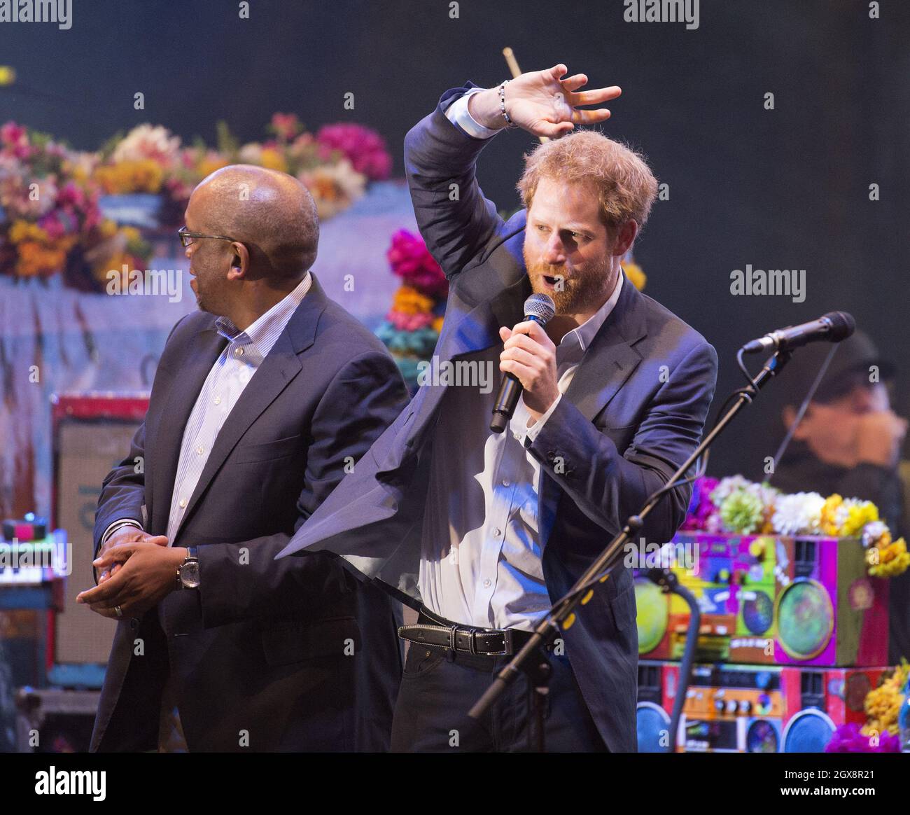 Prince Harry and Prince Seeiso of Lesotho join Coldplay on stage during