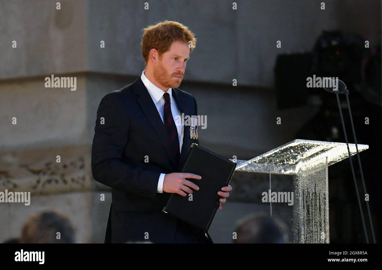 Prince Harry speaks during a vigil to commemorate the 100th anniversary of the battle of the Somme at the Thiepval memorial in France on June 30, 2016    Stock Photo