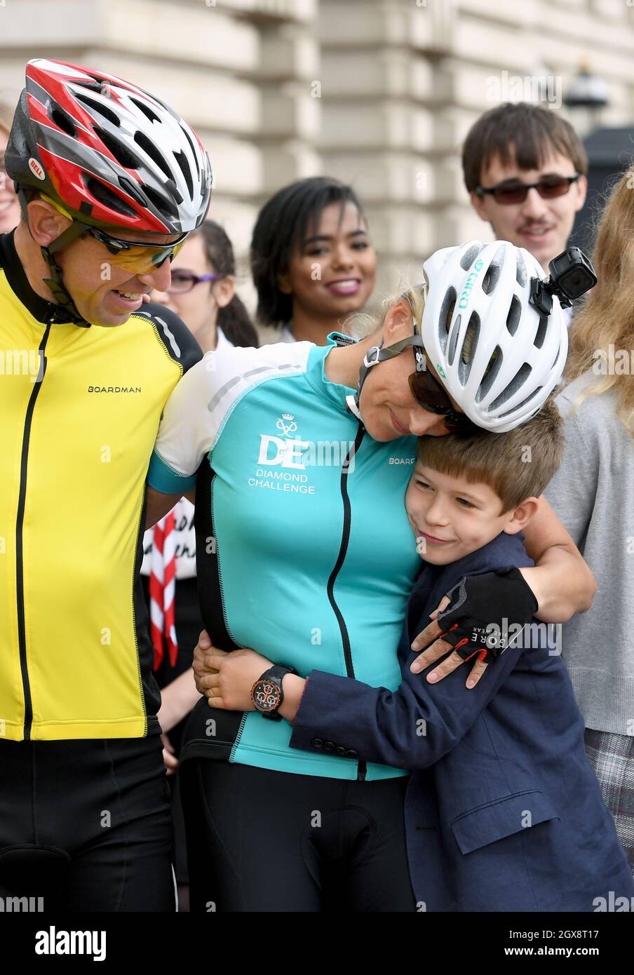 Sophie, Countess of Wessex receives a hug from her son James, Viscount Severn as she arrives at Buckingham Palace to complete her bike ride from Edinburgh to London in support of The Duke of Edinburgh's Award on September 25, 2016. Stock Photo