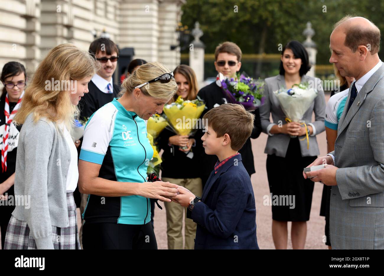 Sophie, Countess of Wessex is greeted by her family, Prince Edward, Earl of Wessex, Lady Louise Windsor  and James, Viscount Severn, as she arrives at Buckingham Palace to complete her bike ride from Edinburgh to London in support of The Duke of Edinburgh's Award on September 25, 2016. Stock Photo