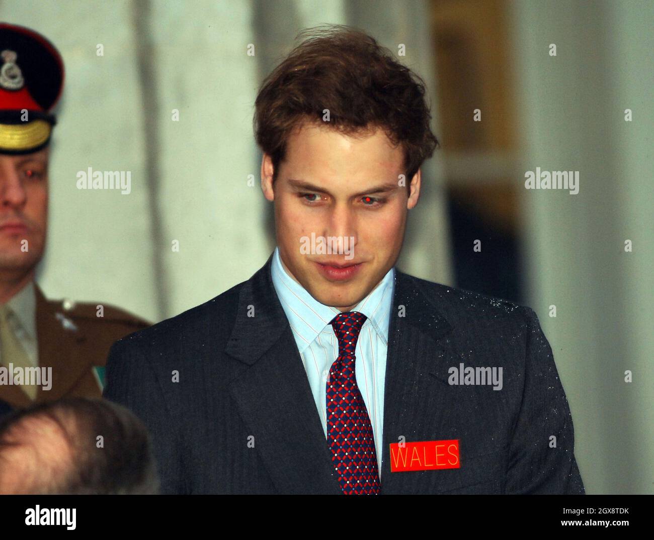 HRH Prince William, wearing his name badge 'Wales', arrives to join his