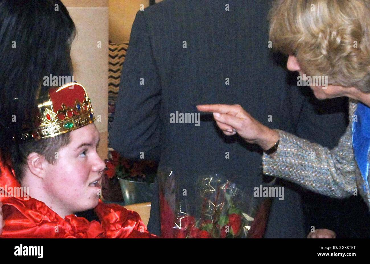 Duchess of Cornwall talks to Paul Parker, 15, at Highgrove House, Tetbury, Gloucestershire. Ten excited youngsters were invited to the Prince's Highgrove estate in Gloucestershire to help the Royal couple decorate their Christmas tree. Charles and Camilla spent nearly an hour chatting and joking with the children, who were all being cared for at the Ty Hafan children's hospice in Barry, South Wales. Anwar Hussein/allactiondigital.com  Stock Photo