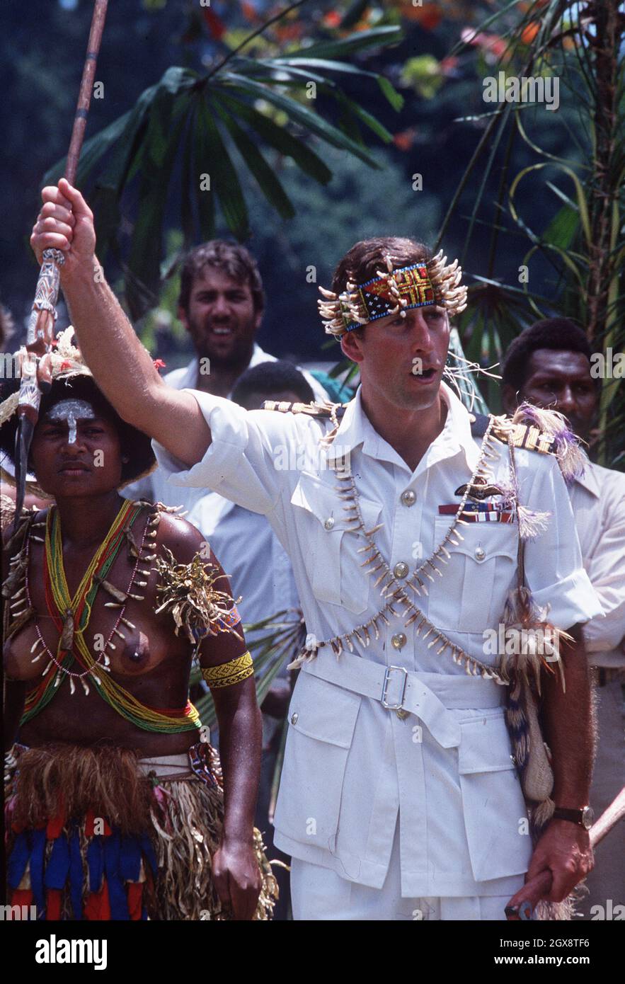 The Prince of Wales brandishes a spear in Papua New Guinea in 1984. Anwar Hussein/allactiondigital.com  Stock Photo