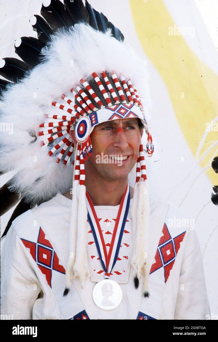 The Prince of Wales becomes Red Indian Chief Red Crow during his visit to Canada in July 1977. Anwar Hussein/allactiondigital.com  Stock Photo