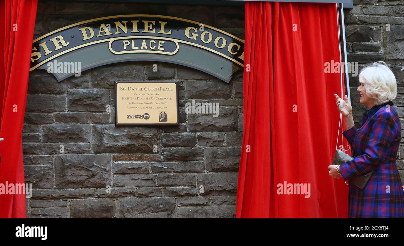 Camilla, Duchess of Cornwall unveils a plaque as she visits Swindon Railway Station to open Sir Daniel Gooch Place on October 20, 2016. Stock Photo