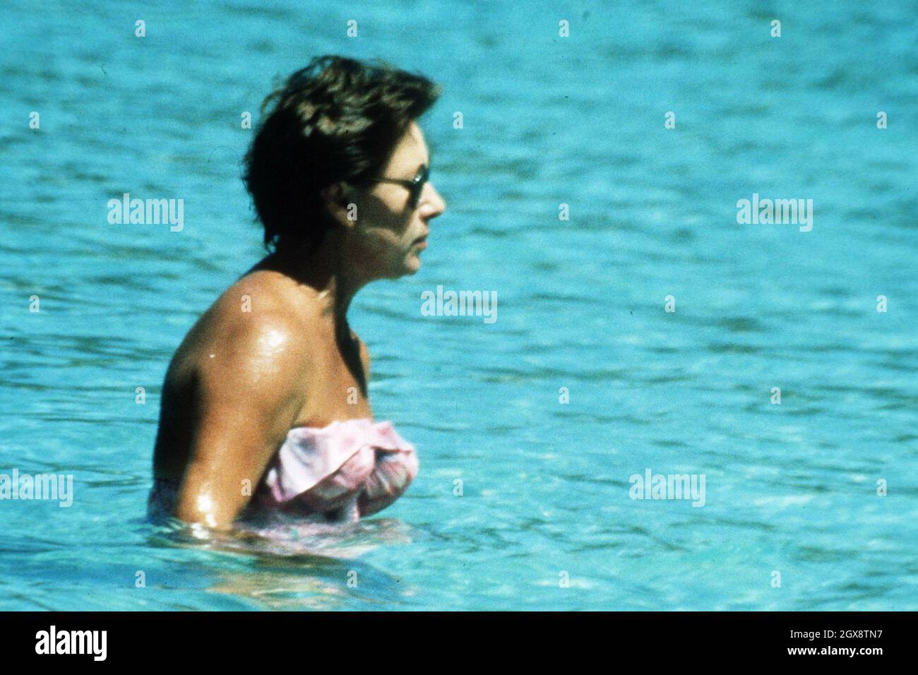 Princess Margaret swimming in Mustique whilst on holiday with boyfriend Roddy Llewellyn in 1976. Stock Photo