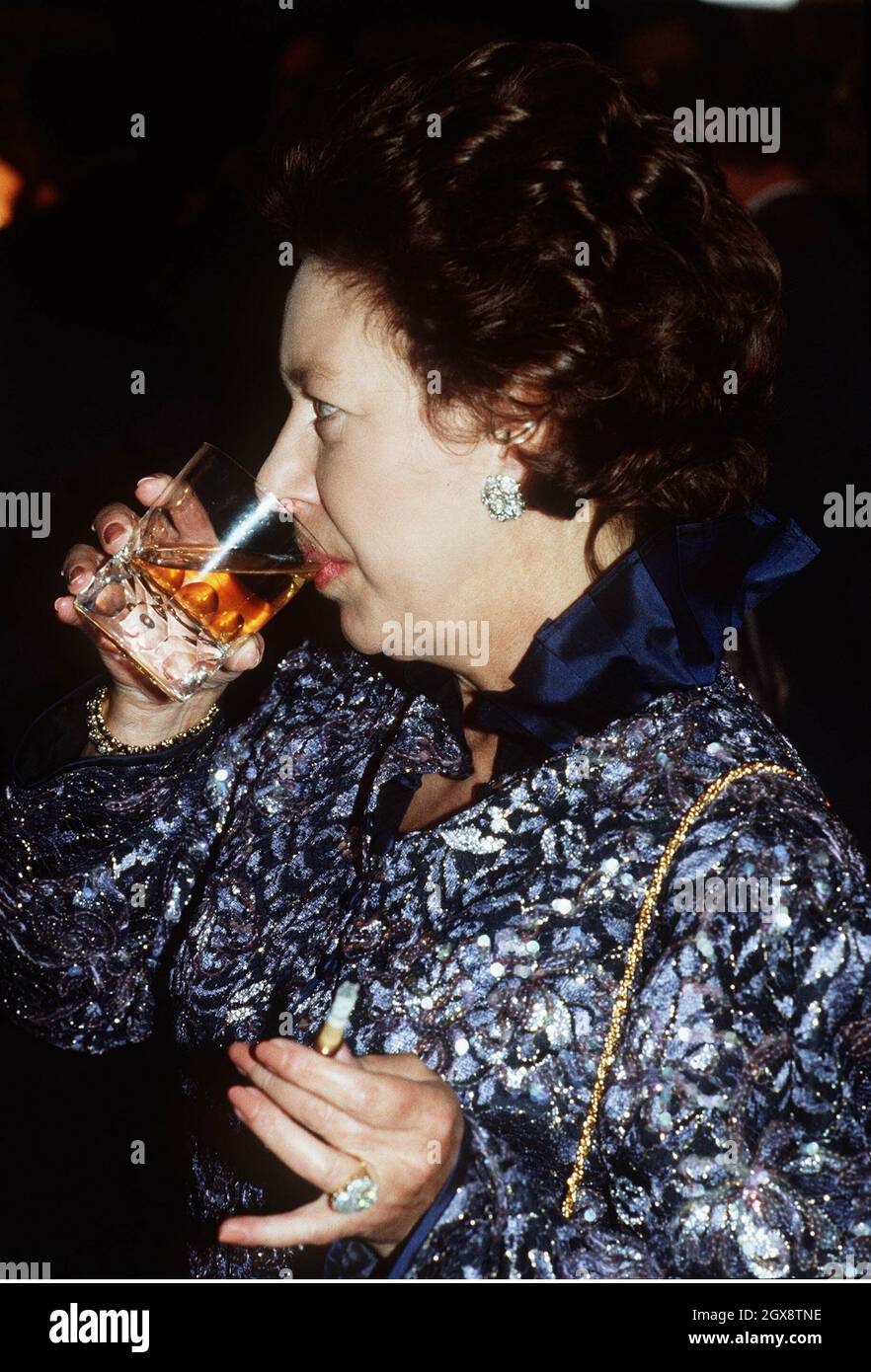 Princess Margaret drinking and smoking Stock Photo
