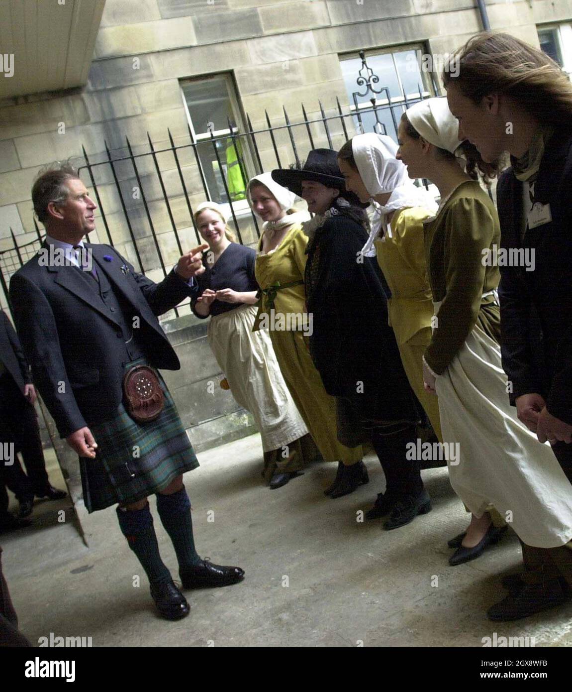 The Prince of Wales is greeted by guides in period costumes as he enters the Real Mary King's Close in Edinburgh. The Prince of Wales visited some of Scotland's top visitor attractions in a bid to raise the profile of the country's tourism industry. Â©Anwar Hussein/allaction.co.uk  Stock Photo