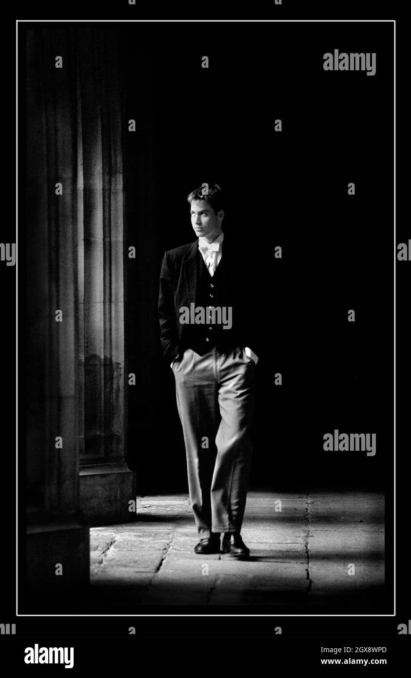 A black and white photo of Prince William wearing Eton's dress of black tail coat together with the distinction of 'stick ups' - the stiff wing collar and white tie - worn by all school officers, Heads of Houses and House Captains. June 2000.  Photo.  Anwar Hussein  Stock Photo