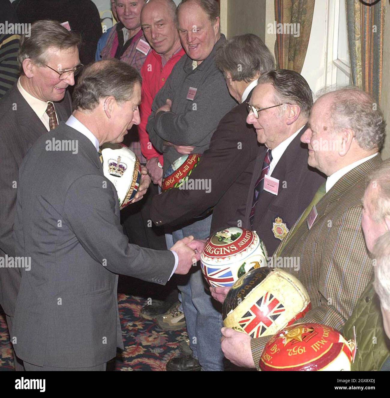 The Prince of Wales meets past scorers and ball painters before the annual game in Ashbourne, derbyshire.  Half length, royals, suit.   Â©Anwar Hussein/allaction.co.uk  Stock Photo