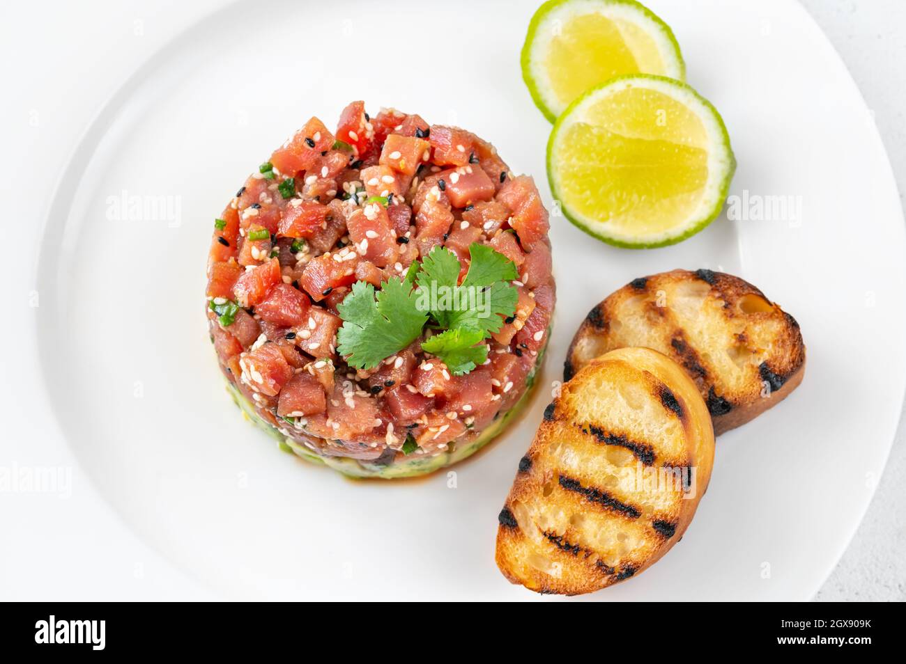 Tuna Tartare with avocado and sesame seeds Stock Photo Alamy