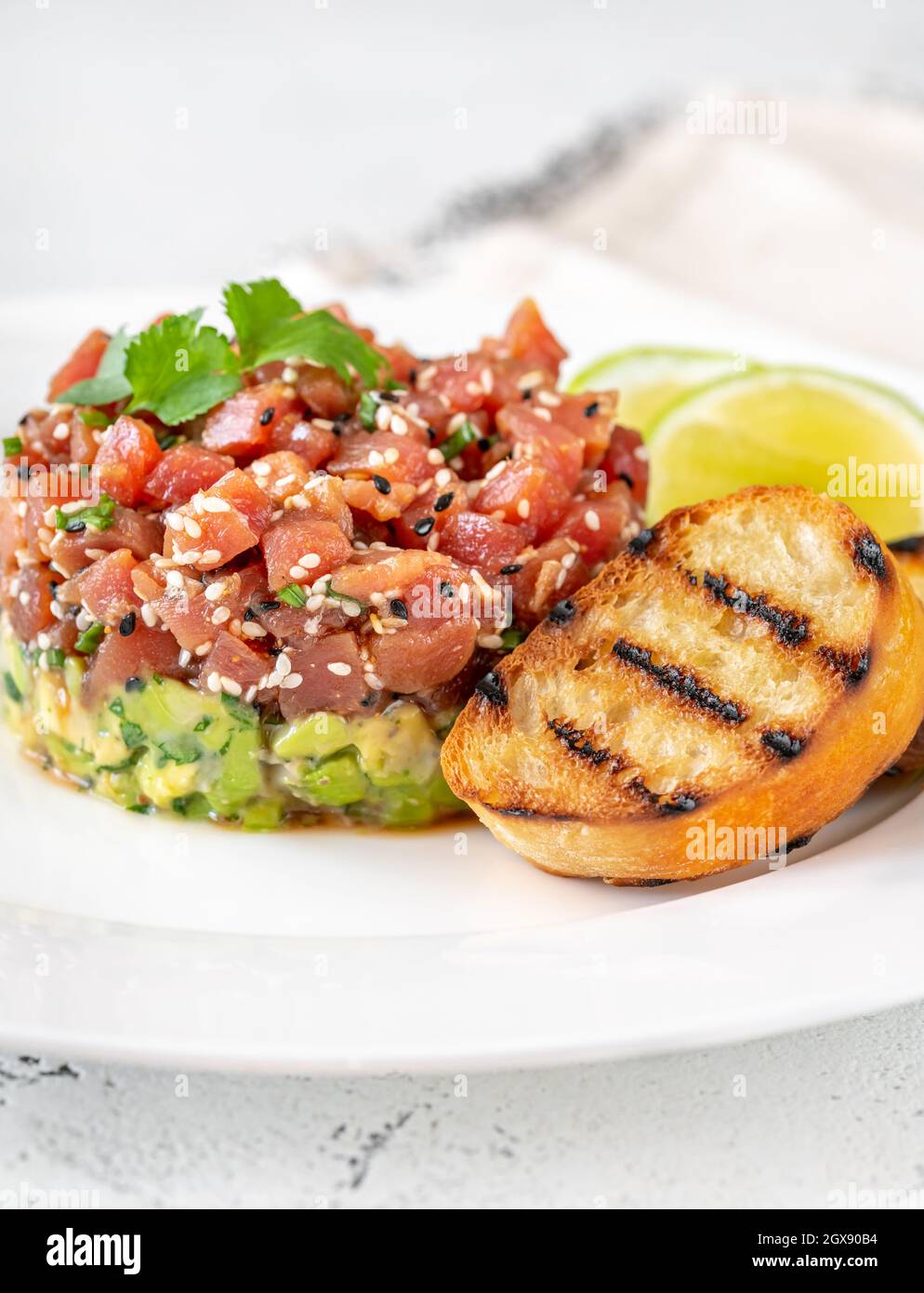 Tuna Tartare with avocado and sesame seeds Stock Photo Alamy