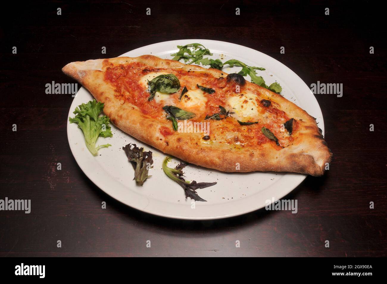 Delicious Italian cuisine known as a calzone Stock Photo - Alamy