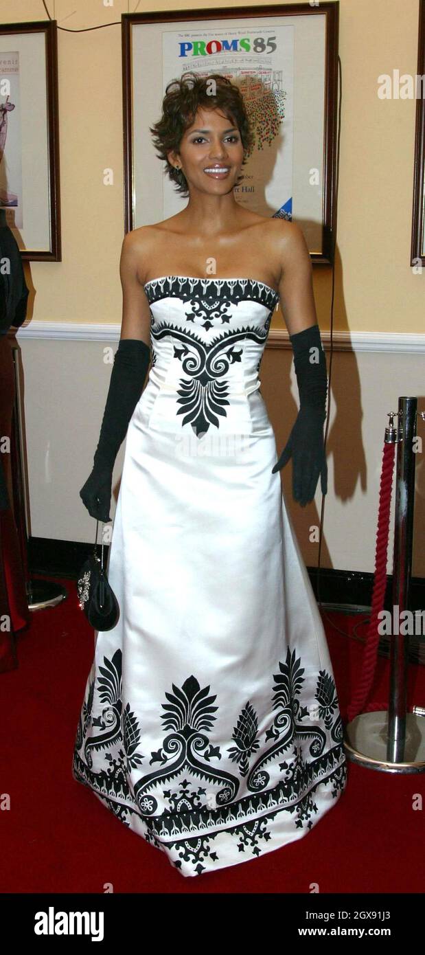 Halle Berry at the World Premiere of the James Bond film Die Another Day  held at London's Royal Albert Hall. full length. strapless dress. black  gloves. embroidery. NO UK SALES FOR 3