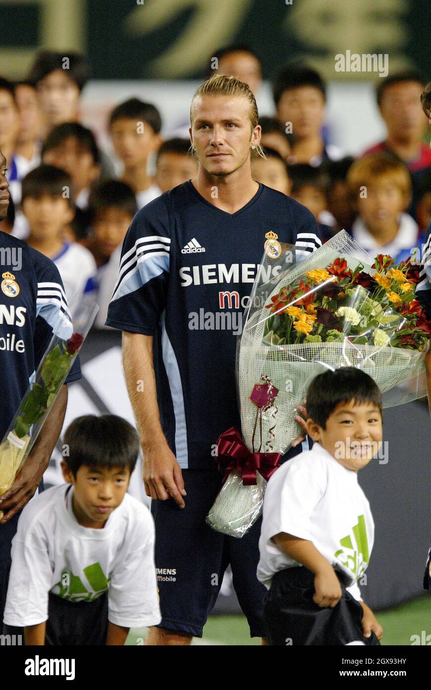 David Beckham and the Real Madrid football team are welcomed by Japanese fans during a childrens football clinic at Tokyo Dome. Â©ipj/fujifotos/allaction.co.uk    Stock Photo