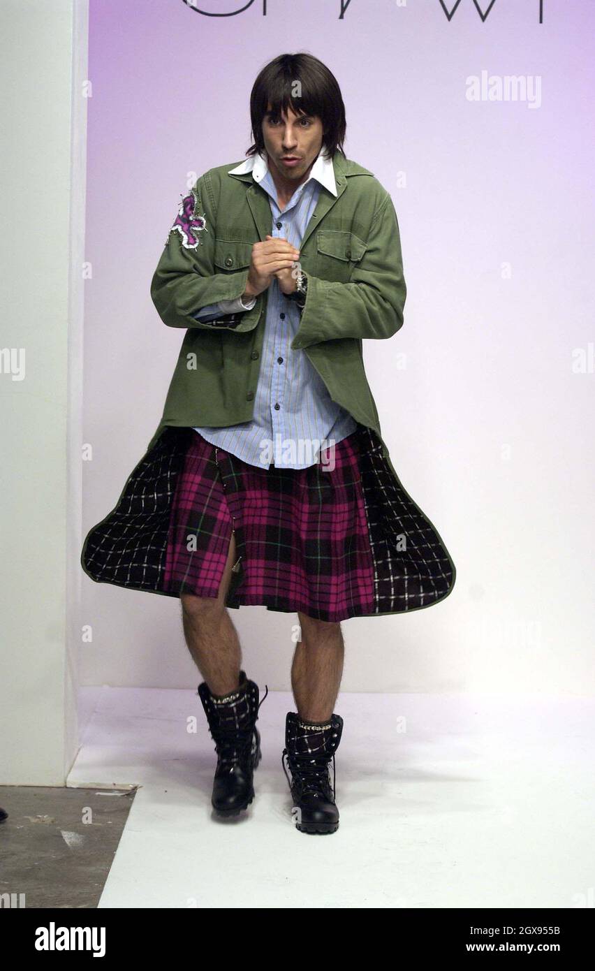 Anthony Kiedis on the catwalk at the Shawn Fashion show in Los Angeles. Kilt, boots, red hot