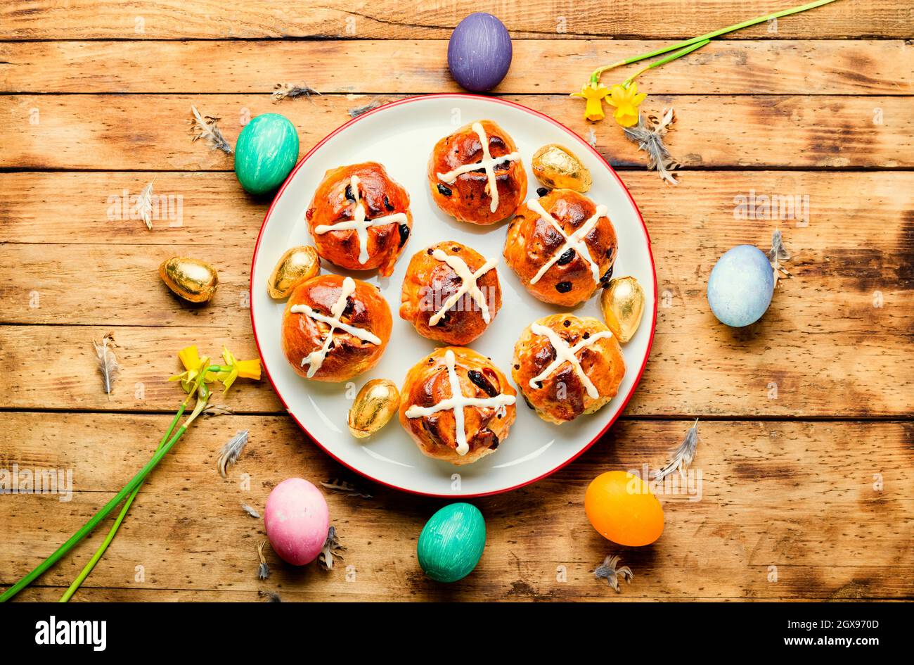 Easter hot cross buns and holiday decor.Easter baked goods Stock Photo