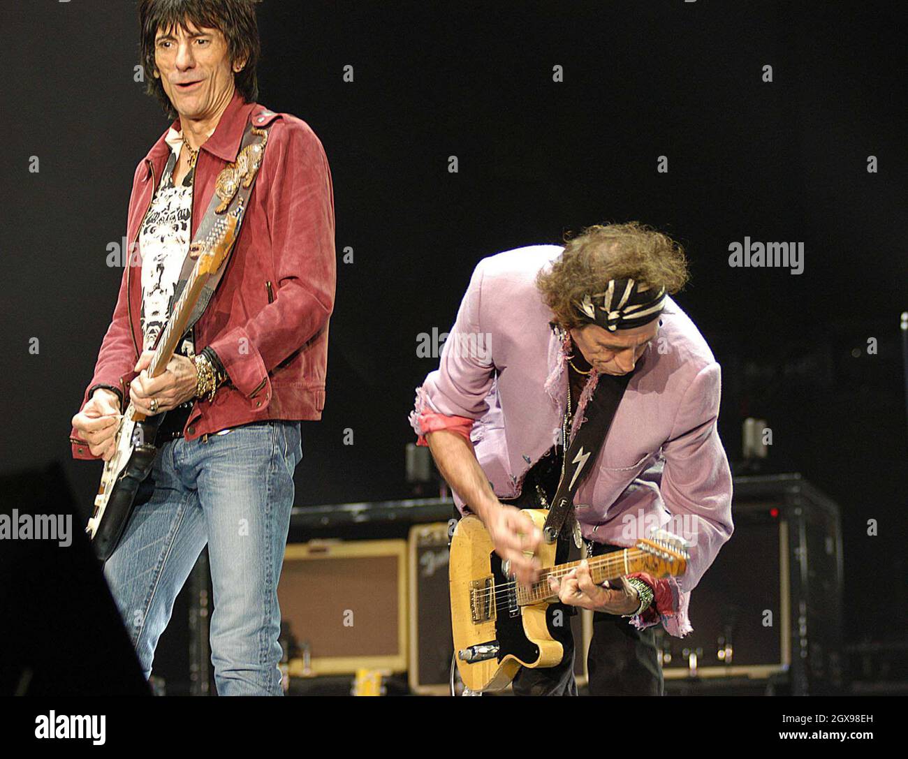 Rolling Stones guitarists Ronnie Wood and Keith Richards perform live
