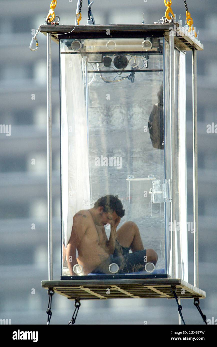 David Blaine continues his stay in a glass box near Tower Bridge in London  Stock Photo - Alamy
