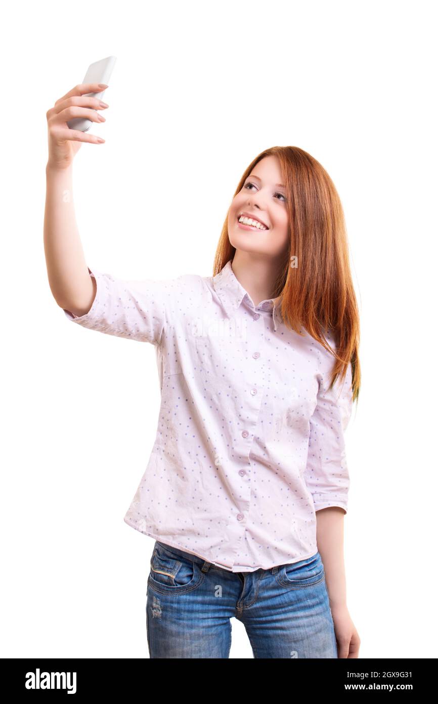 Portrait of a beautiful smiling young woman in smart casual clothes ...