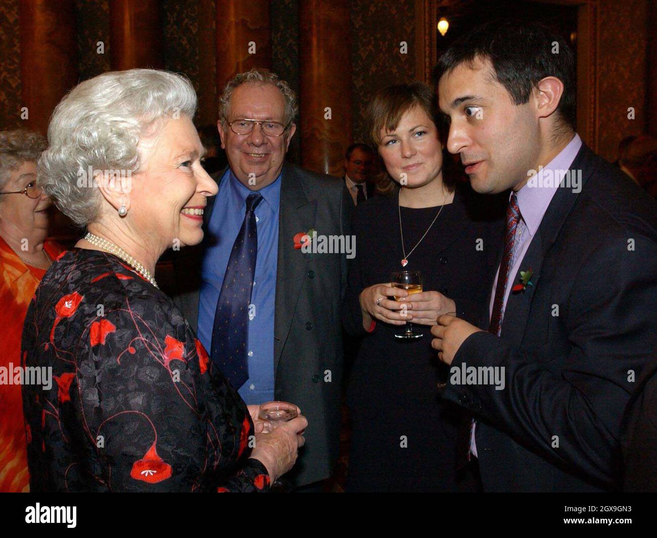 The Queen chats with Liberal Democrat MP for Oxford West and Abingdon, Dr  Evan Harris (right) and girlfriend Elizabeth O'Hara, at a reception at  Buckingham Palace, London, for Members of Parliament and