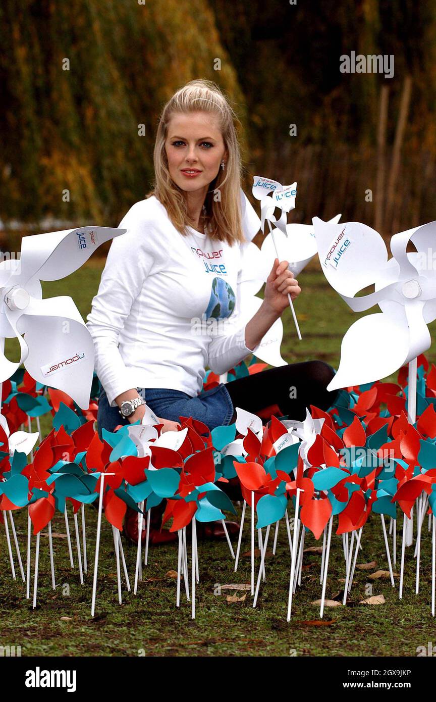 TV presenter Donna Air was windswept amongst a sea of windmills to lend her support to the official switch on of the UK's first large-scale offshore wind farm at the Bandstand, Regent's Park, London. Stock Photo