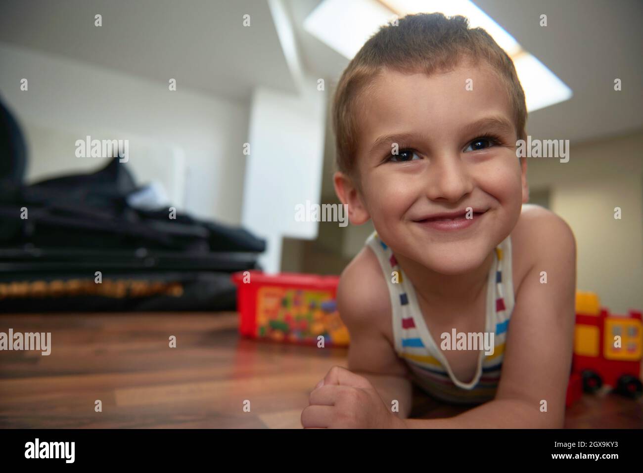 Little boy child playing with creative plastic toys indoor, building ...