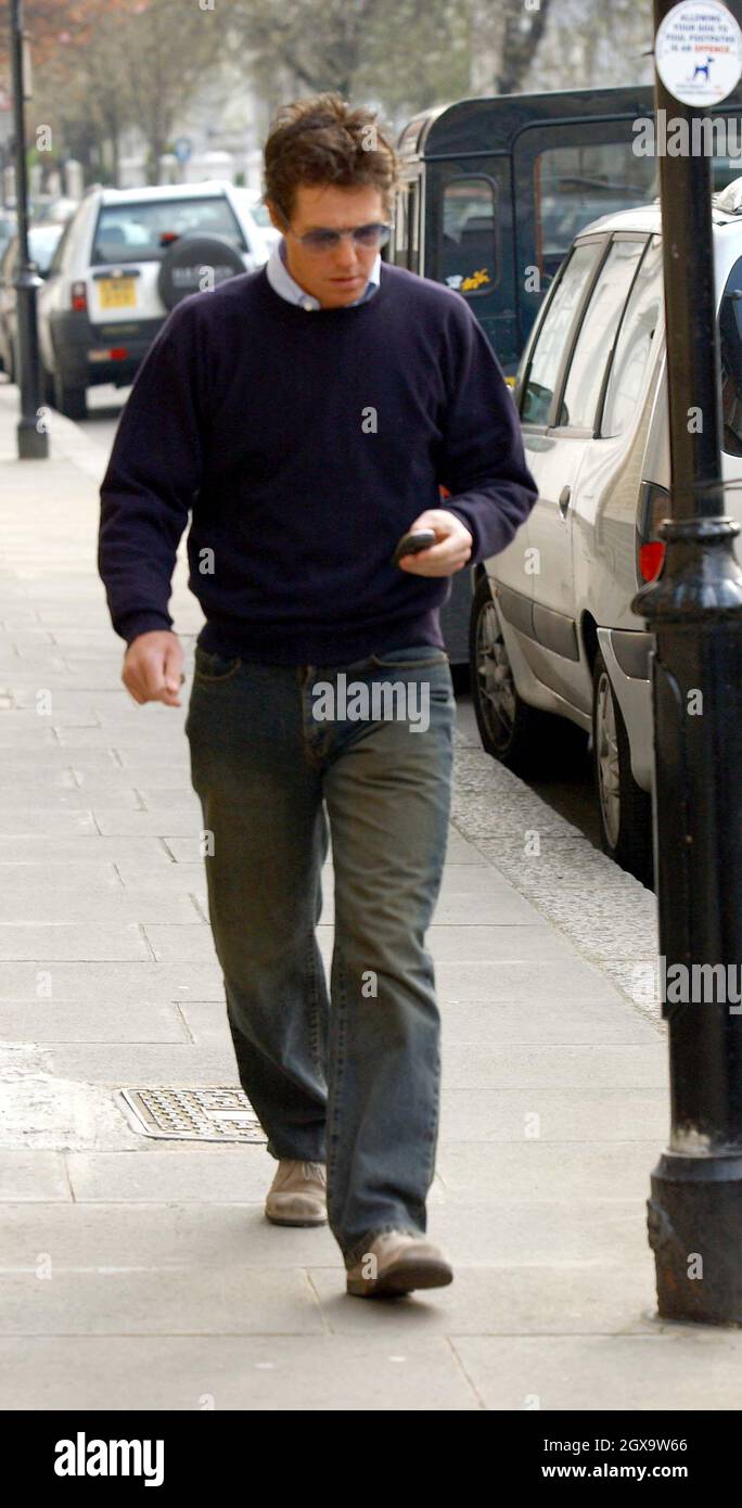 Hugh Grant At Ex Wife Liz Hurleys Home In London On The 1st Birthday Of Her Son Damian Stock
