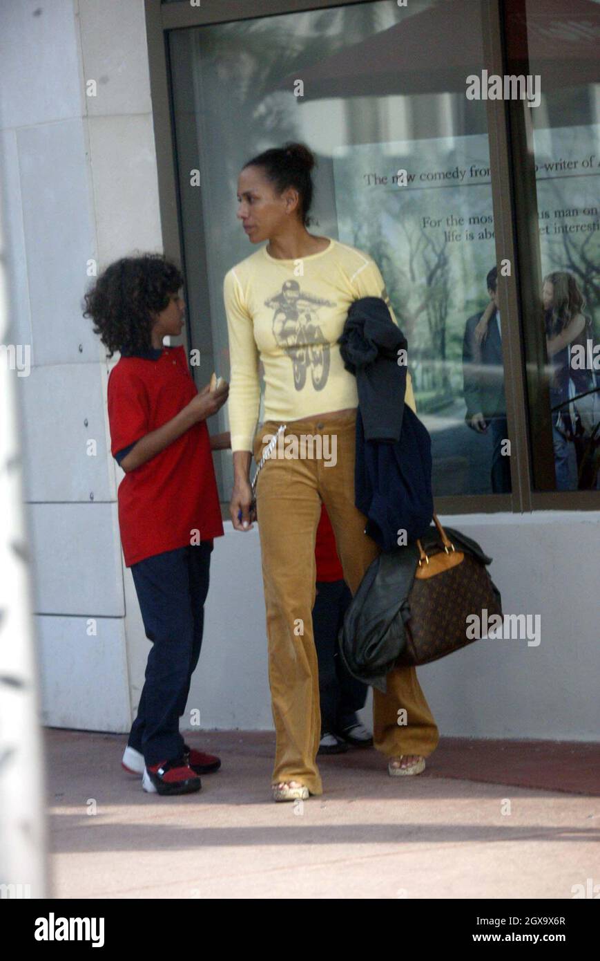 Barbara Feltus aka Barbara Becker, takes Noah and Elias Balthazar to the Movies in Miami Beach. Stock Photo