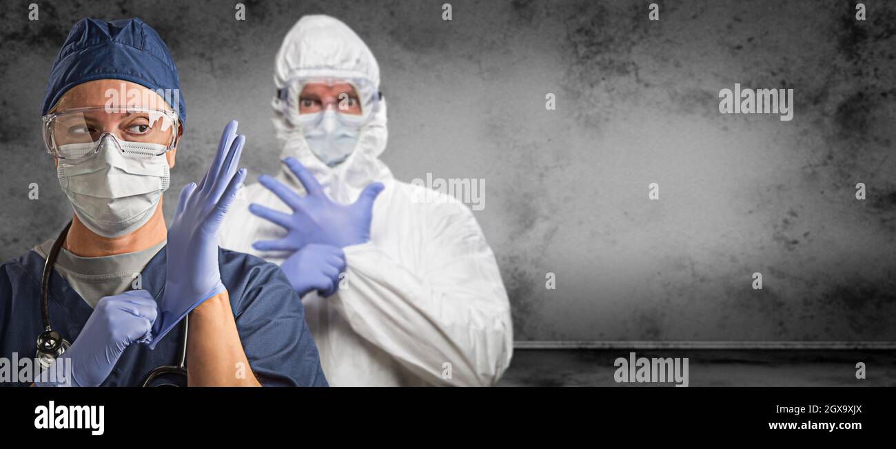 Female and Male Doctors or Nurses Wearing Scrubs and Protective Mask