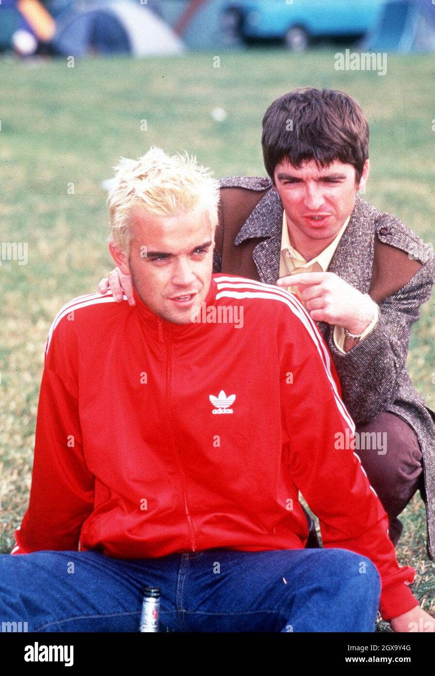 Robbie Williams and Liam Gallagher from Oasis Stock Photo Alamy