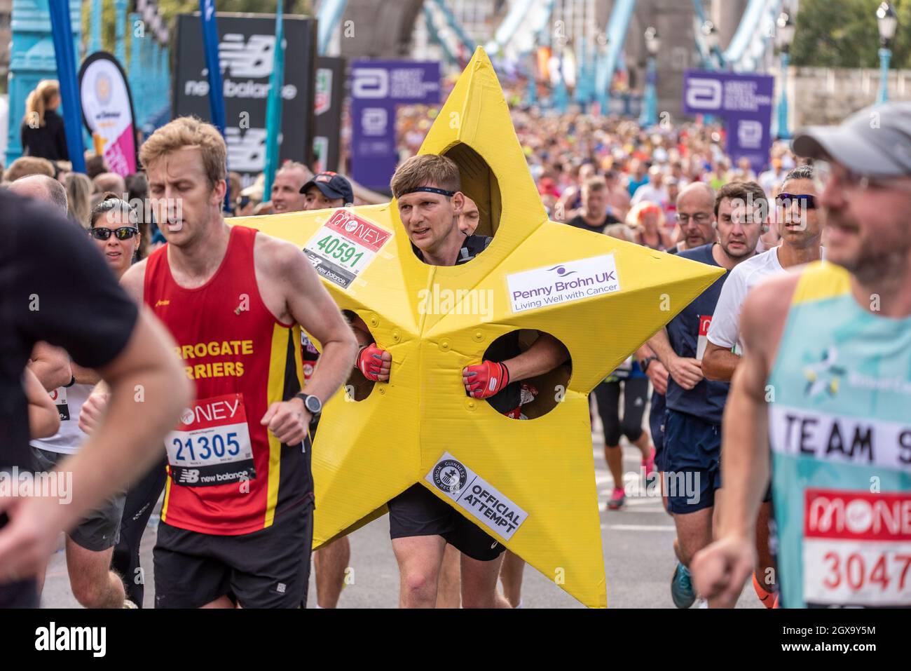 Matthew Brooks racing in the Virgin Money London Marathon 2021, in Tower Hill, London, UK
