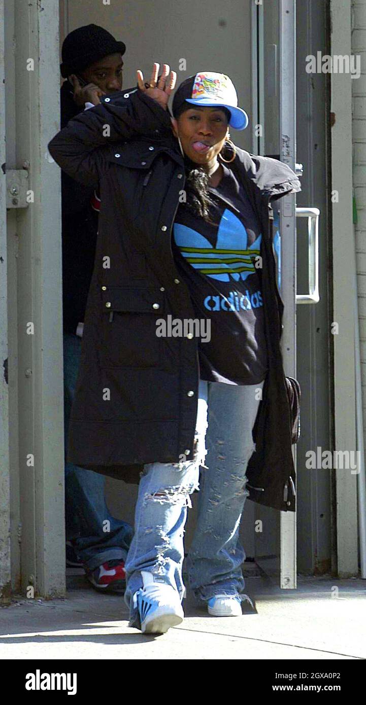 Missy Elliot gets funny as she leaves the Adidas store in Soho Stock Photo  - Alamy