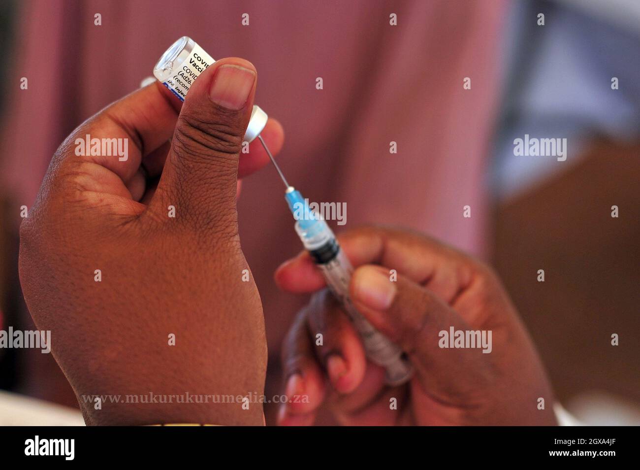 Medical staff vaccinate citizens for covid-19 at a makeshift vaccination site in Moletjie a rural village in Limpopo, South Africa Stock Photo